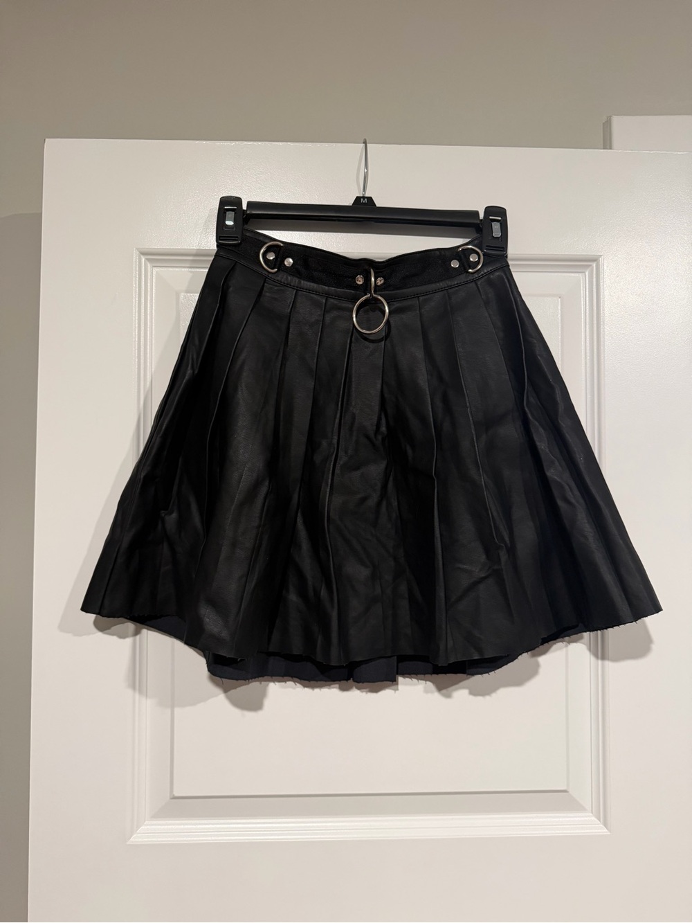 Dolls Kill Current Mood Black Pleated Pleather Spade Mini Skirt with Ring Detail
